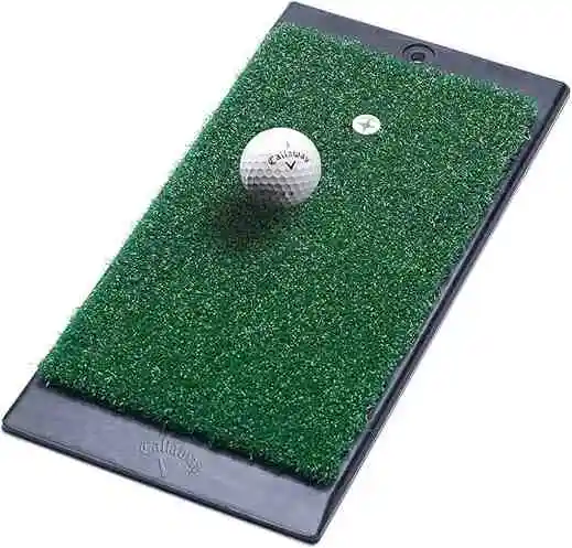A Callaway Golf Launch Zone Hitting Mat is shown with a Callaway golf ball placed on the artificial turf.